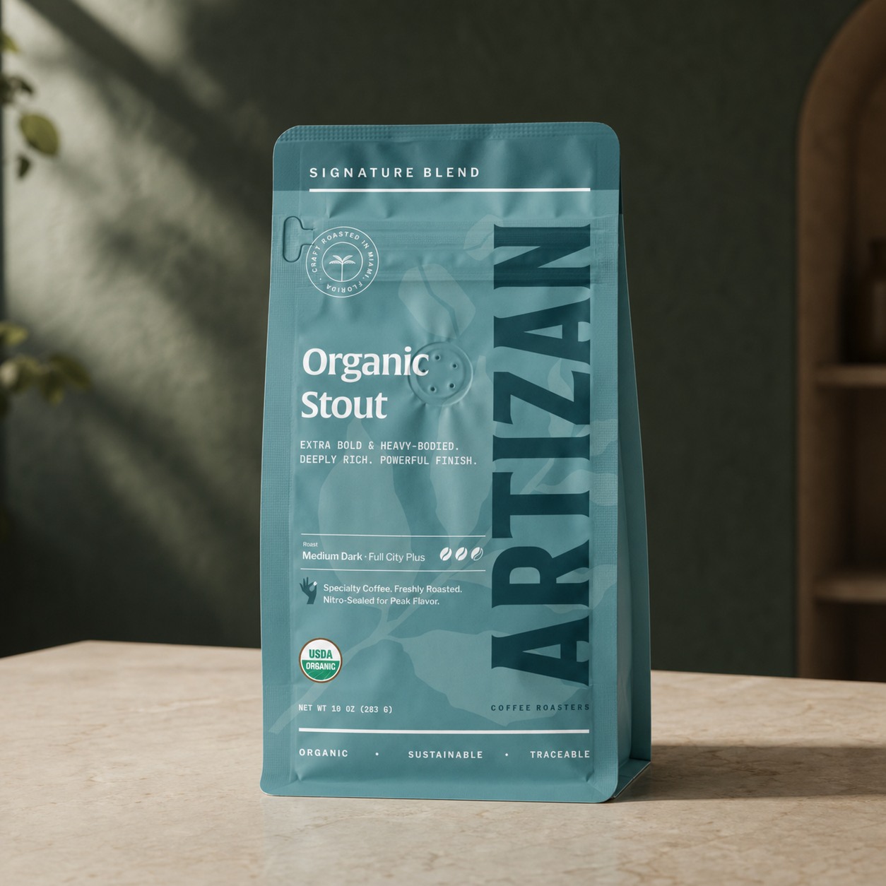 Artizan Coffee Roasters Organic Stout coffee bag in premium product photography